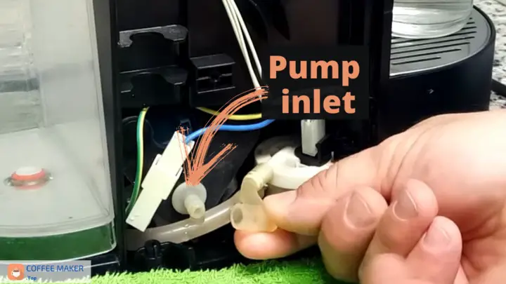 Disconnect the pipe at the pump inlet