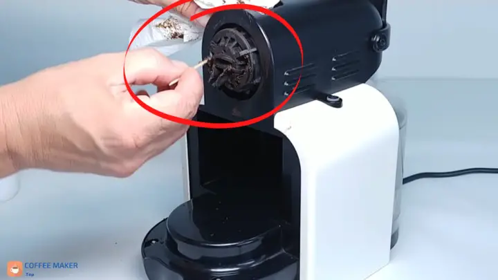 Clean the inside of the Nespresso head thoroughly